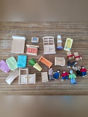 bundle of wooden dollhouse pieces